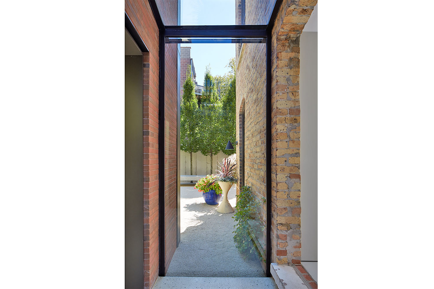 Custom Home Builders Chicago - Wicker Park Residence view of yard from inside