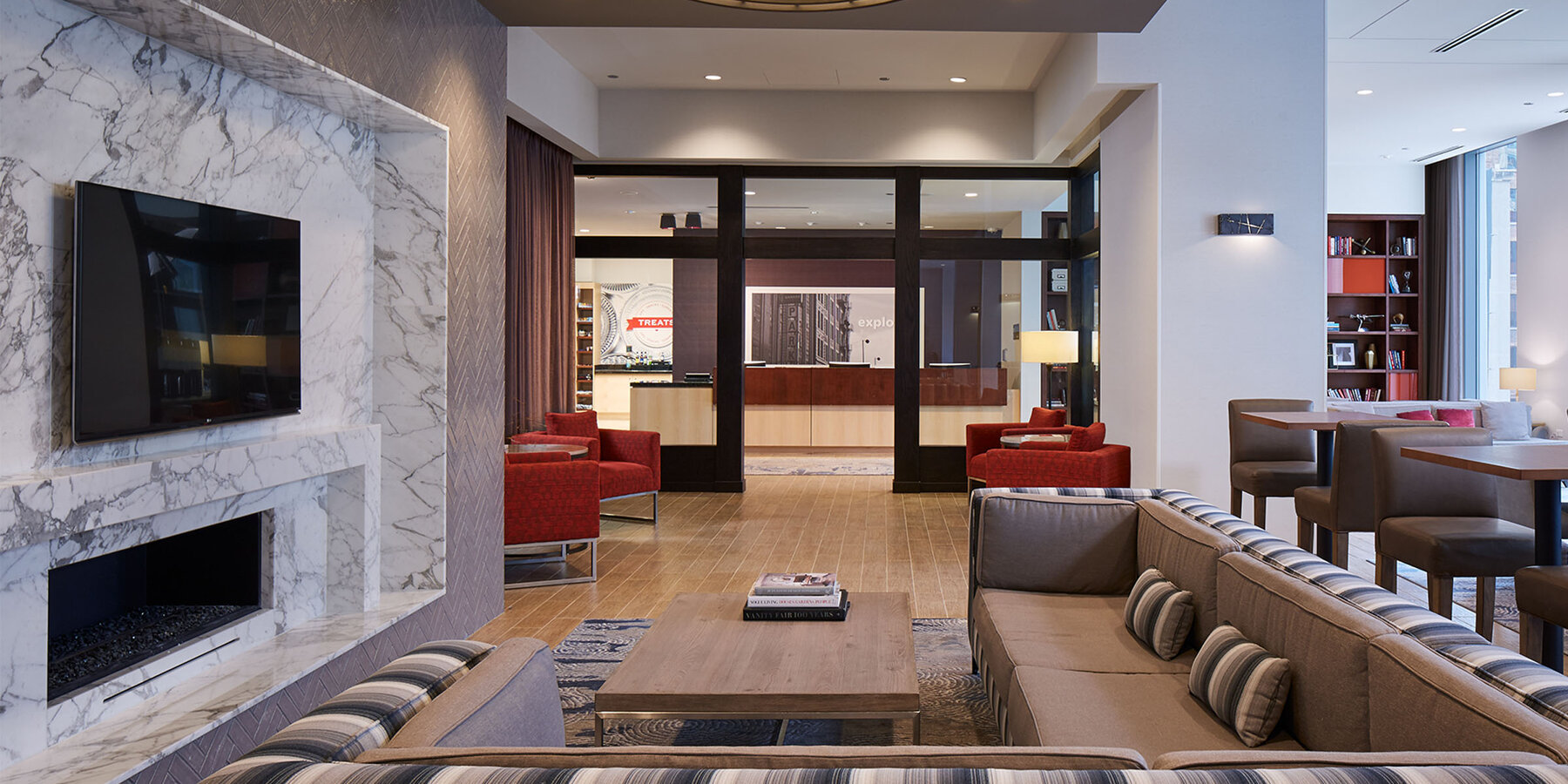 Hotel Construction Chicago - Hampton Inn & Homewood Suites lounge seating with fireplace