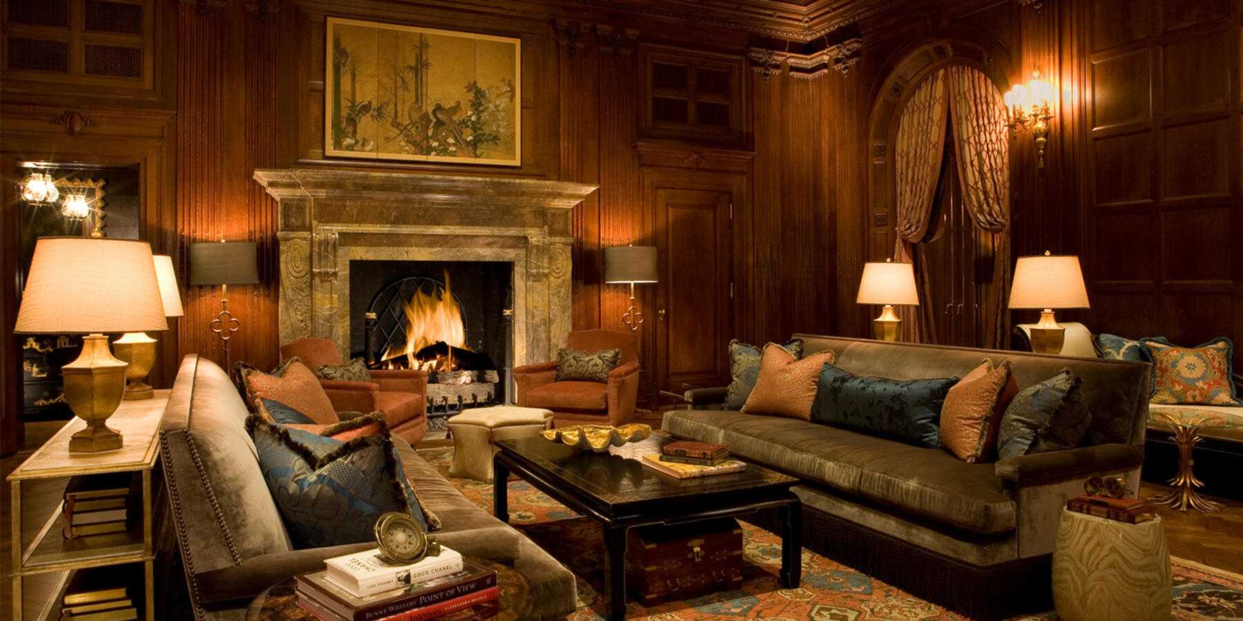 Chicago Historic Home Renovation - State Parkway Residence wood-paneled living room with fireplace