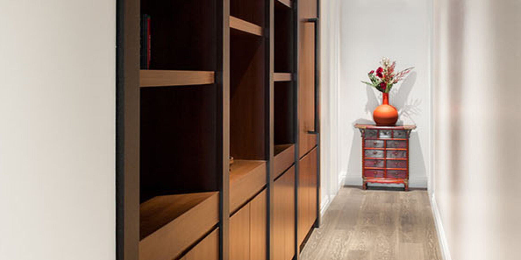 Luxury Residential Home Construction - Drake Tower Chicago hallway with built-in shelving