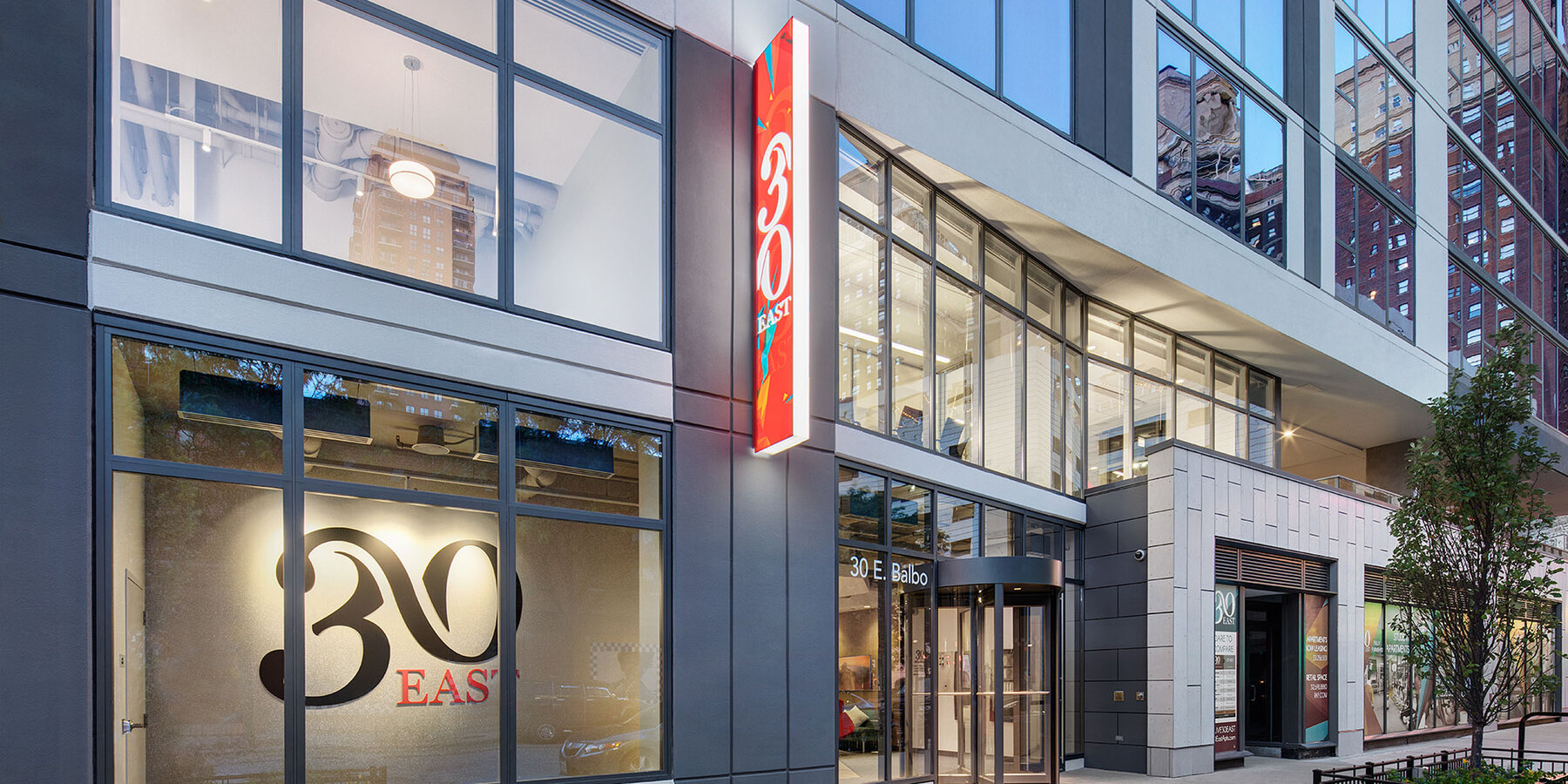 Luxury Apartment Complex Construction - 30 East exterior entrance at street level