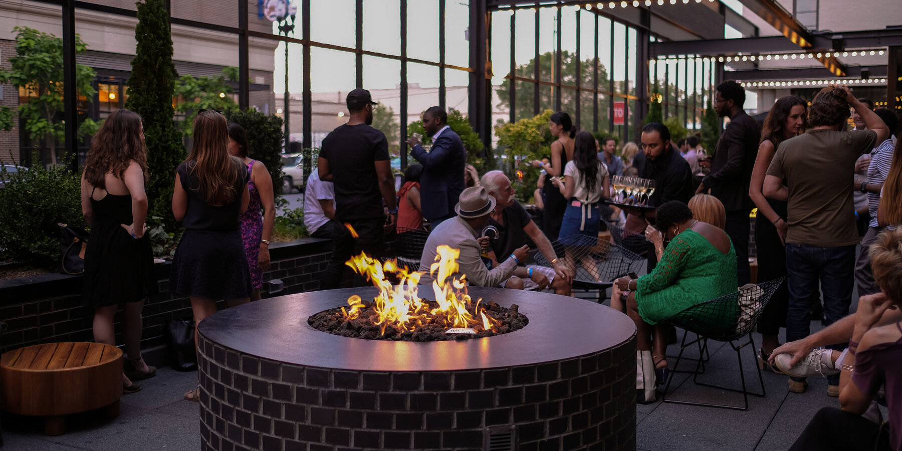 Boutique Hotel Construction - Ace Hotel Chicago City Mouse outdoor space with fire pit