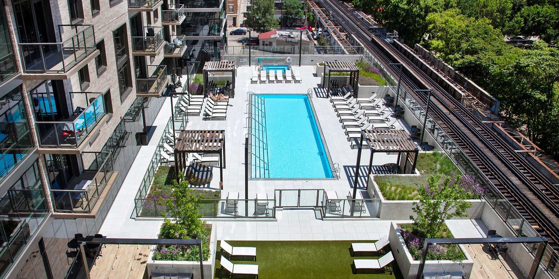 CHICAGO APARTMENT COMPLEX CONSTRUCTION - NORTH+VINE APARTMENTS EXTERIOR AMENITY POOL 