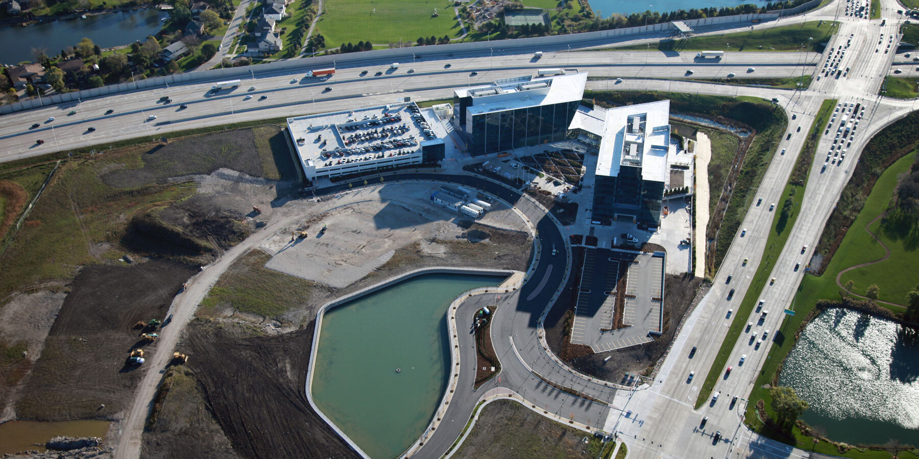 Corporate Office Construction - Astellas Pharma Headquarters aerial landscape with lake
