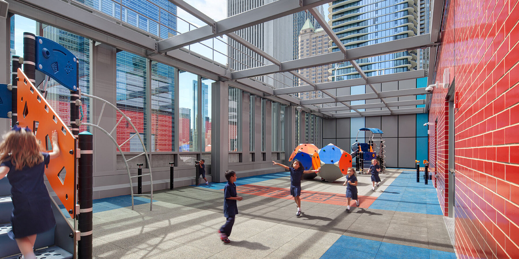Chicago Top School Construction - Gems World Academy rooftop playground with curtainwall