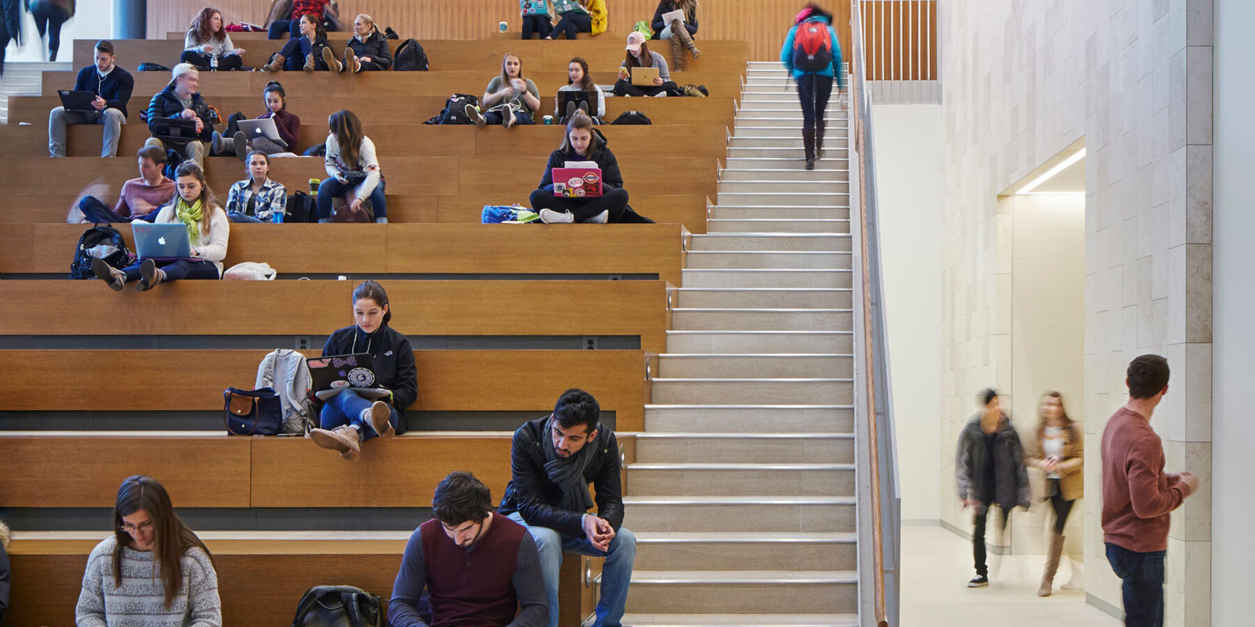 Higher Education Construction - Loyola Schreiber Center Quinlan School of Business grand stairwell with students