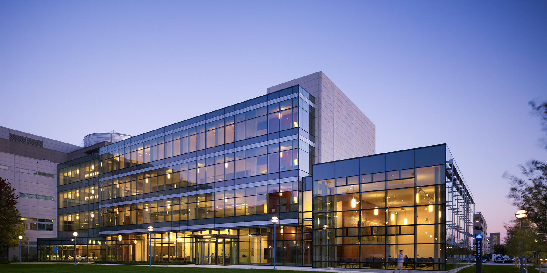 Chicago Education Construction - Loyola Niehoff Nursing School exterior at dusk