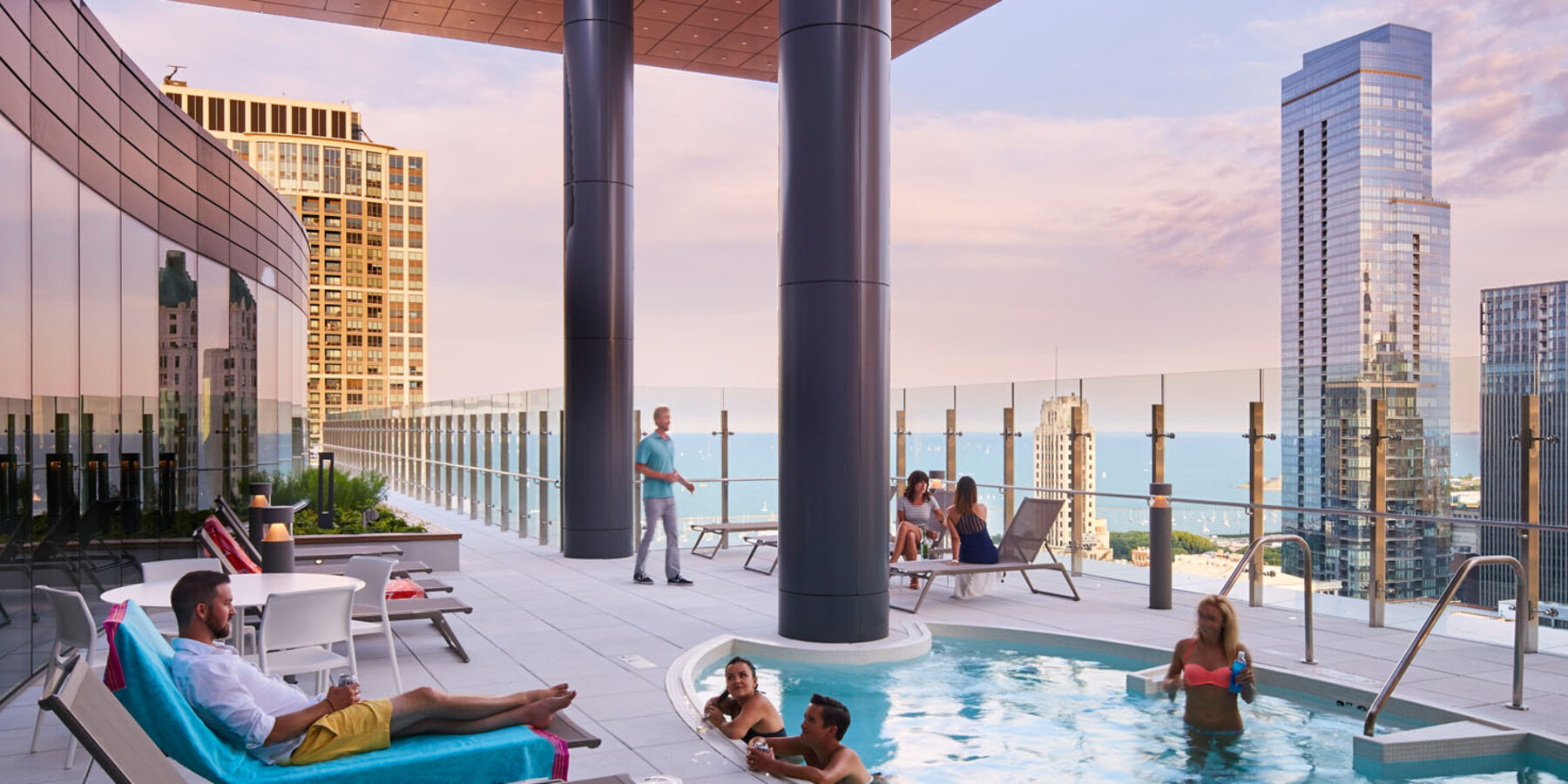 Apartment Complex Construction - Marquee at Block 37 rooftop lounge at dusk with views of Chicago skyline