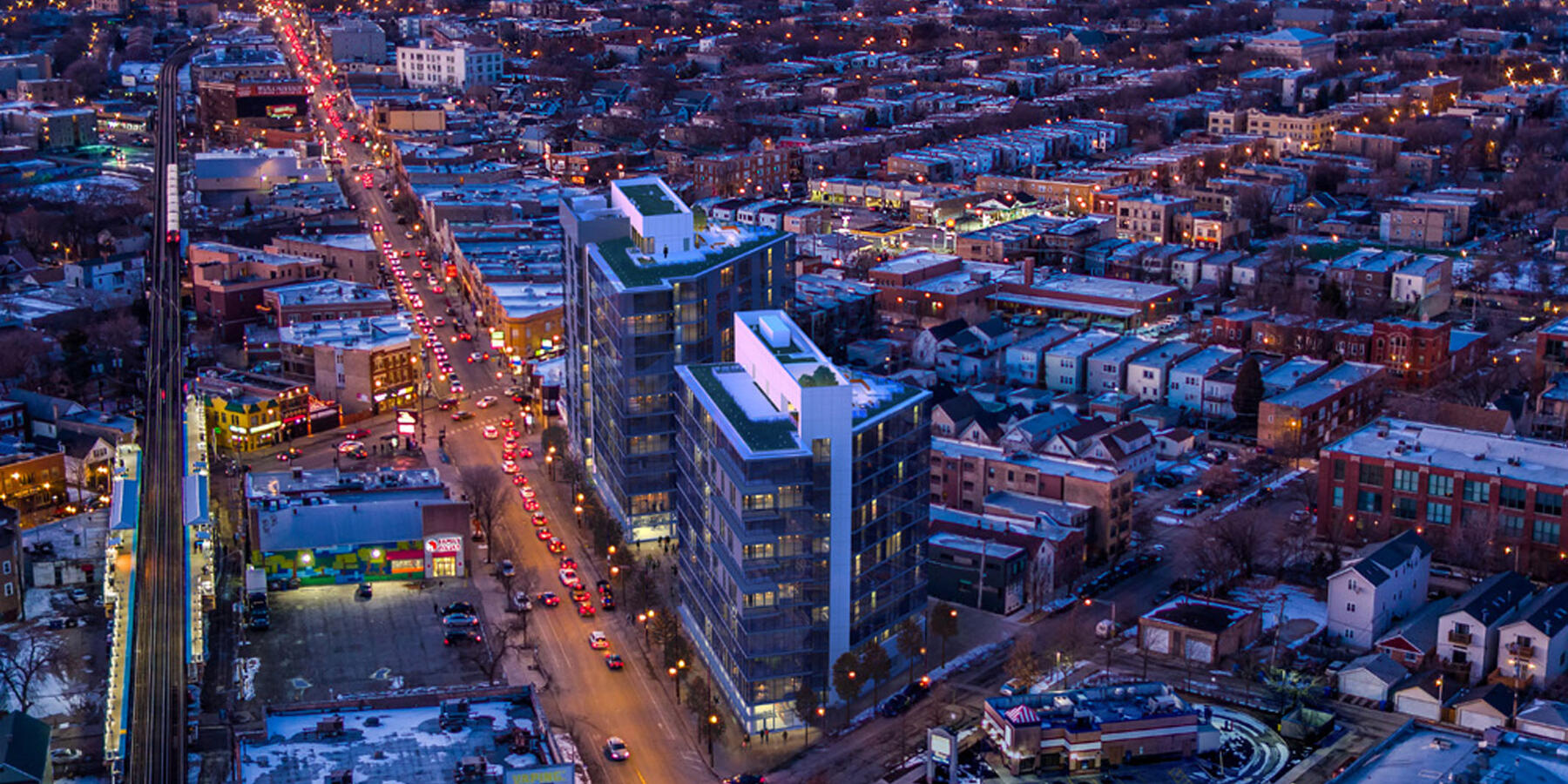 Chicago Apartment Complex Construction - Mica Apartments exterior aerial view at night