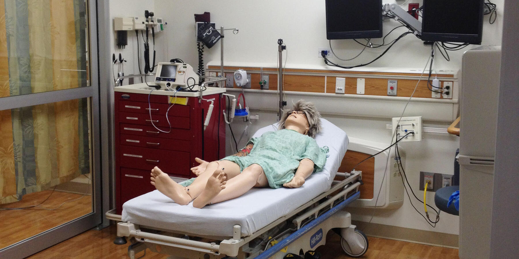 Science Lab Construction - Northshore Simulation Center patient room with medical equipment