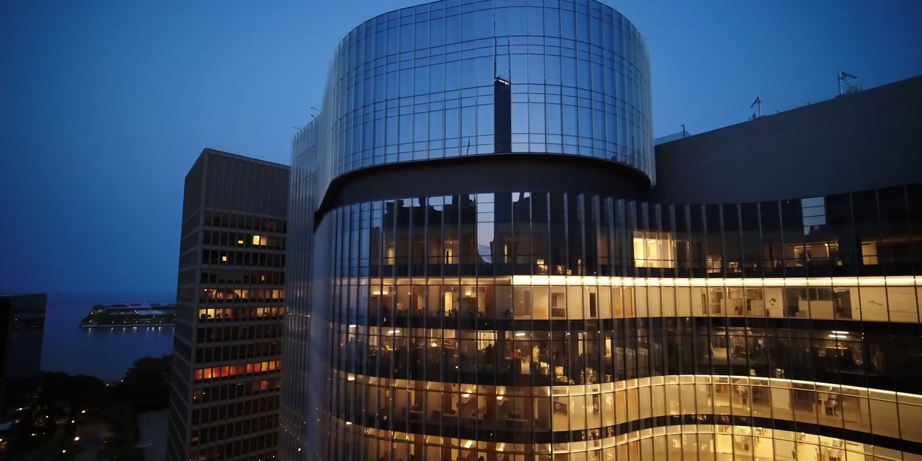 Science Lab Construction - Northwestern Simpson Querrey exterior view at night with Lake Michigan