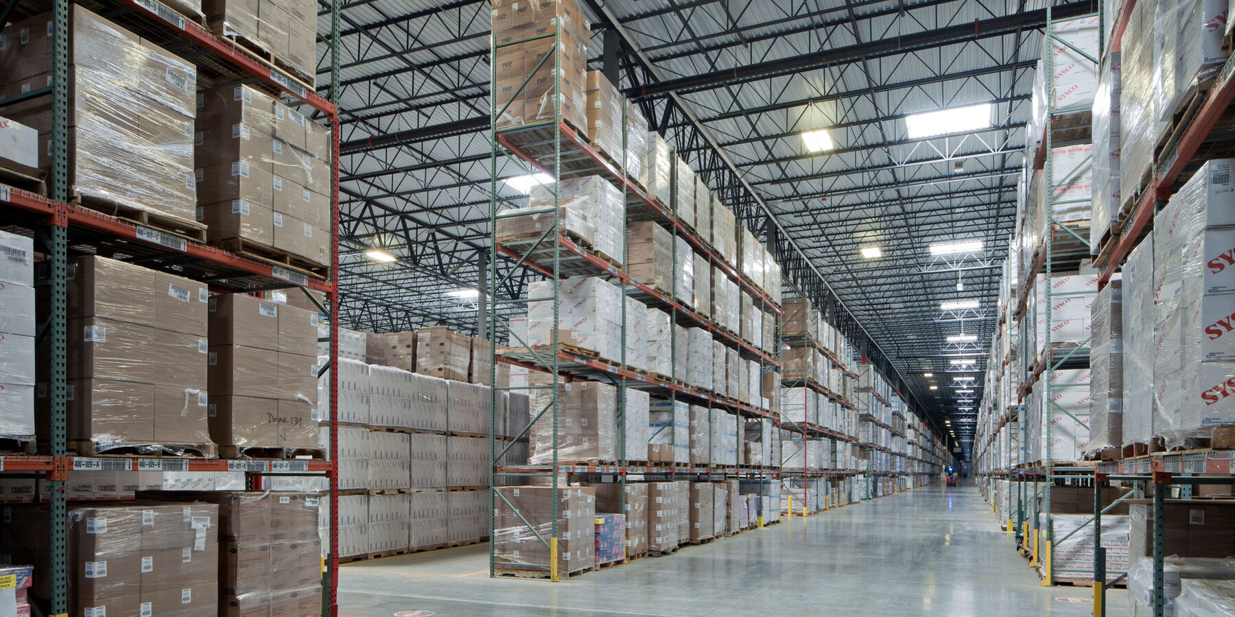 Industrial Construction & Renovation - Pinnacle XV Pactive warehouse hallway and storage shelves