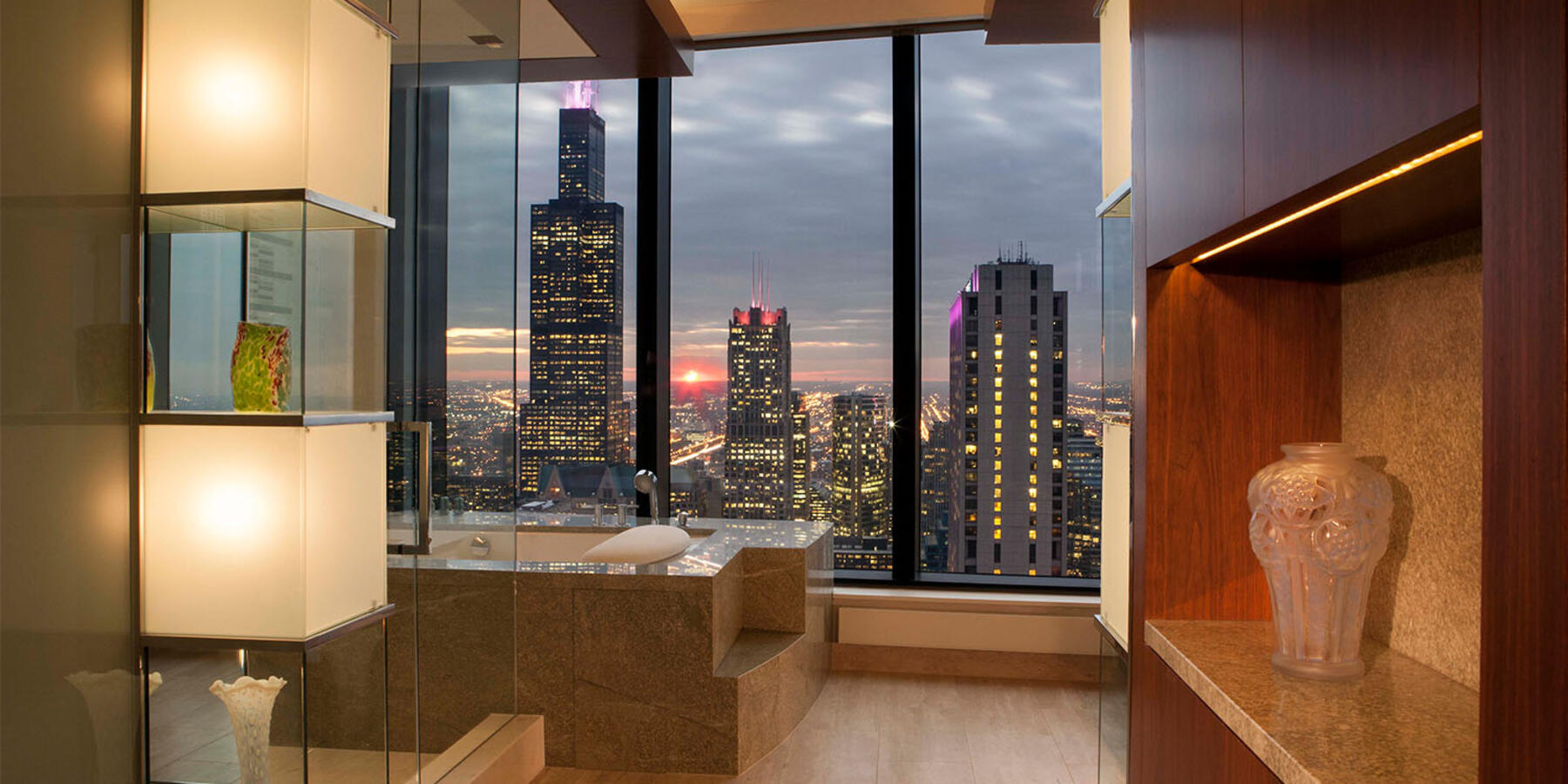 High End Home Contractors Chicago - The Legacy interior with skyline views at dusk