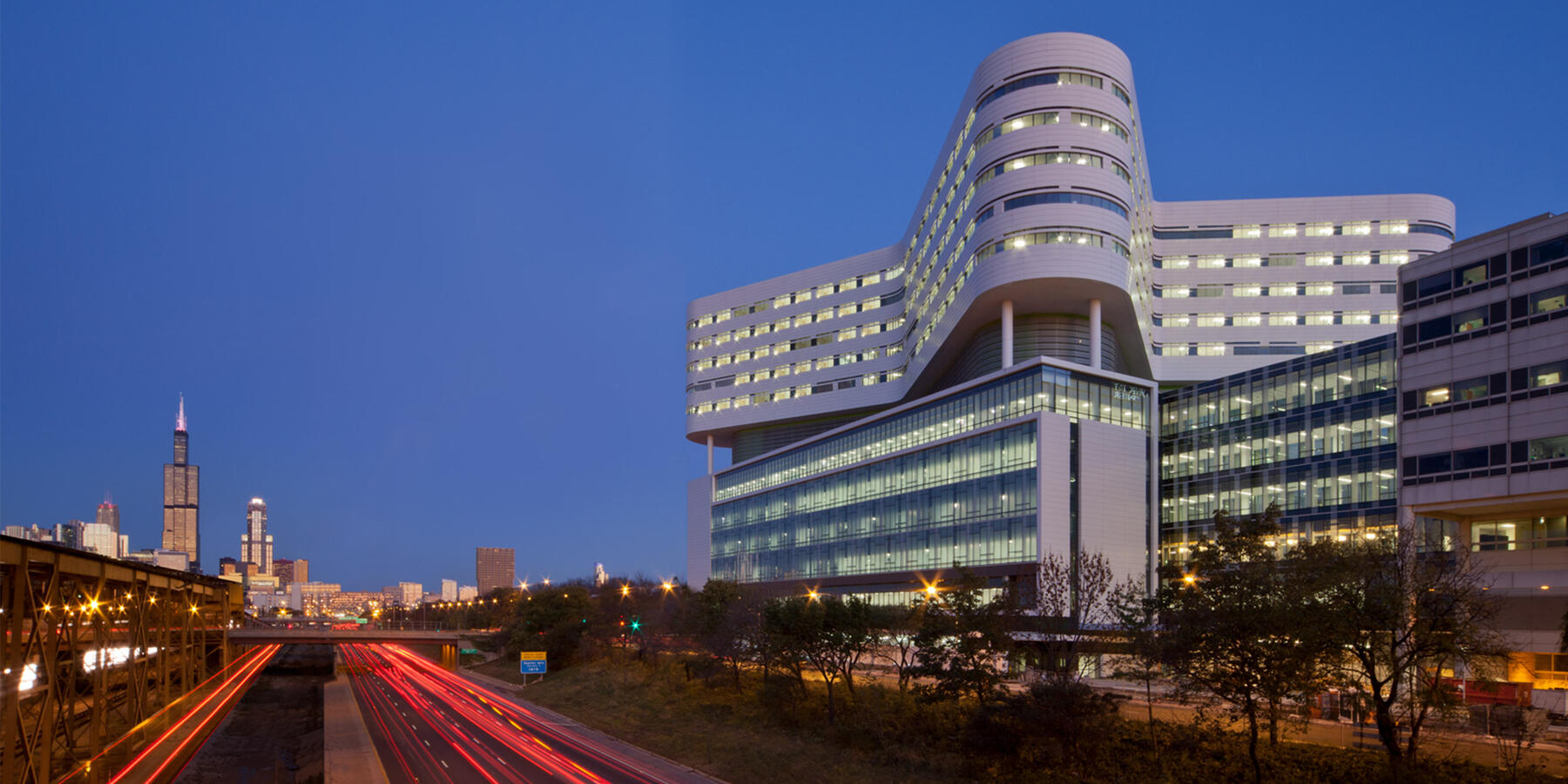 Hospital Campus Construction | Rush Medical Center Chicago exterior at dusk