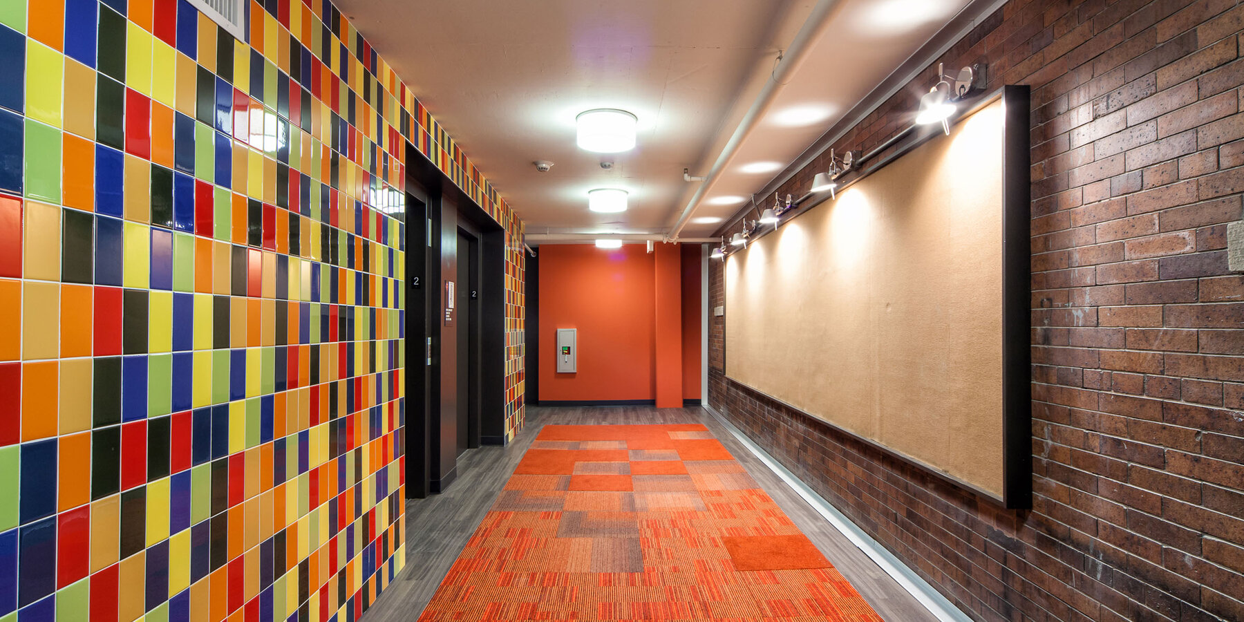 LGBTQ Senior Living Construction - Town Hall Apartments lobby and elevator bay