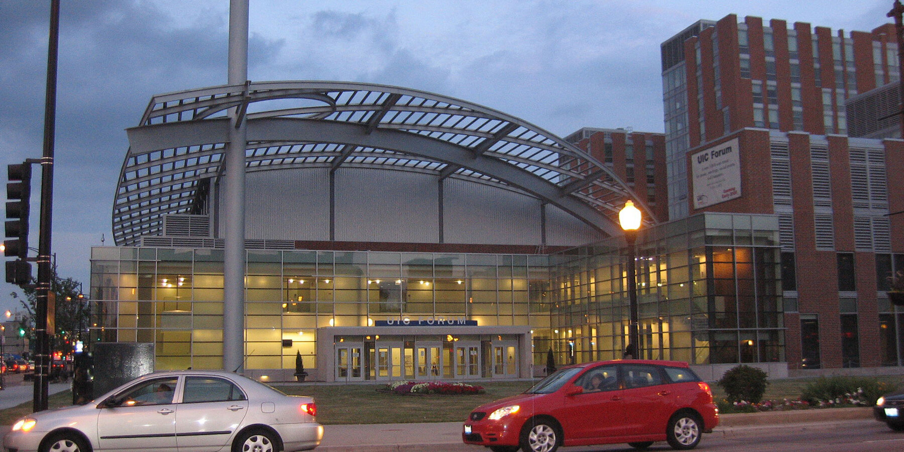 Chicago Campus Construction UIC Student Housing Stukel Towers exterior entrance at dusk