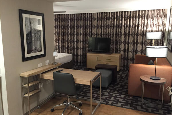 Hotel Construction Chicago - Hampton Inn & Homewood Suites guest suite with kitchen and desk
