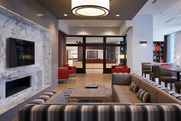 Hotel Construction Chicago - Hampton Inn & Homewood Suites lounge seating with fireplace