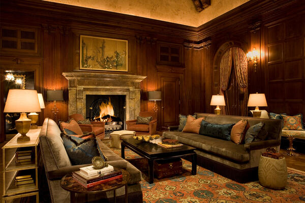 Chicago Historic Home Renovation - State Parkway Residence wood-paneled living room with fireplace