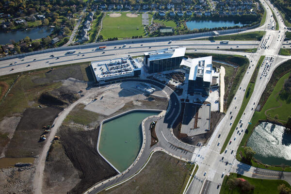 Corporate Office Construction - Astellas Pharma Headquarters aerial landscape with lake