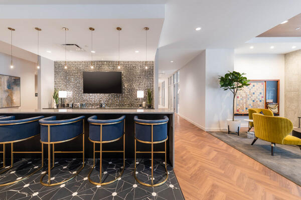 Senior Living Construction Chicago - Avidor Evanston lounge area with bar seating