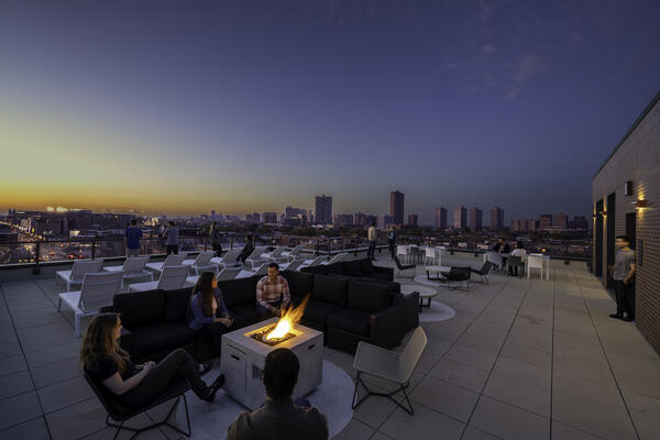 APARTMENT COMPLEX CONSTRUCTION - PANORAMA APARTMENTS OUTDOOR TERRACE WITH GRILS AND FIREPIT