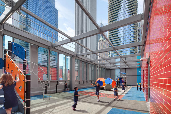 Chicago Top School Construction - Gems World Academy rooftop playground with curtainwall