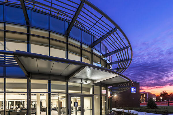 Higher education construction - Harper College campus exterior at dusk