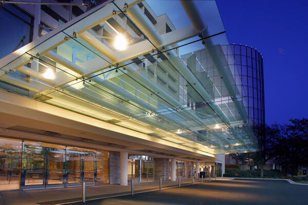 Hotel Construction & Renovation - Hyatt Regency O'Hare exterior entrance and driveway at night