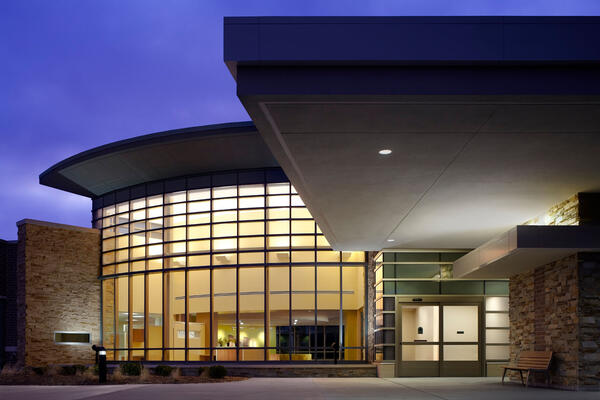 Healthcare Construction Solutions - Kishwaukee Cancer Center exterior at dusk