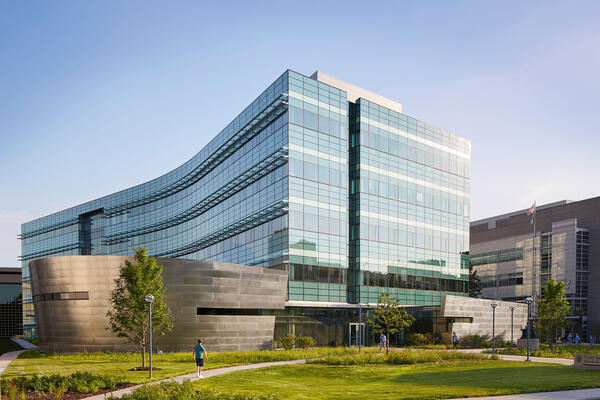 Life Sciences Construction Project - Loyola Chicago CTRE exterior view of northwest side and curved curtainwall