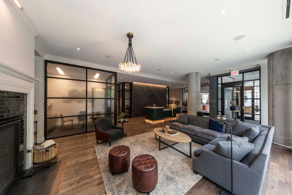 Chicago Apartment Complex Construction - Marlowe lobby sitting area with fireplace and concierge desk