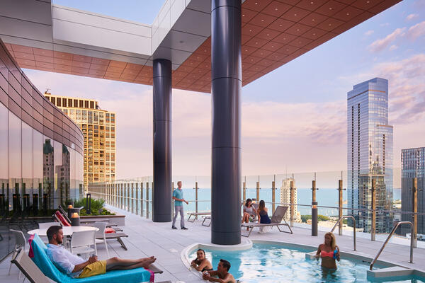 Apartment Complex Construction - Marquee at Block 37 rooftop lounge at dusk with views of Chicago skyline