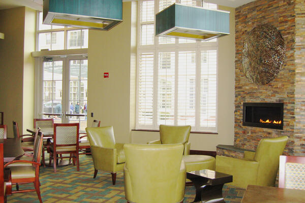 Retirement Community Construction Project - The Mather lounge seating with fireplace