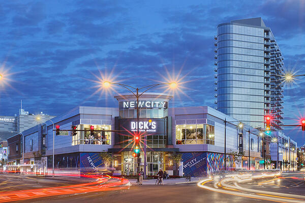 Urban Retail Center Construction - New City Chicago exterior at dusk