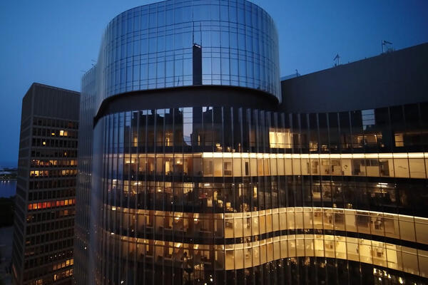 Science Lab Construction - Northwestern Simpson Querrey exterior view at night with Lake Michigan