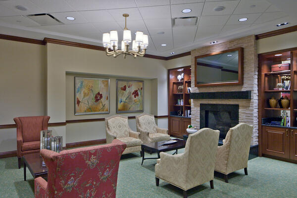 Senior Living Construction - Presbyterian Homes Lake Forest seating area with fireplace