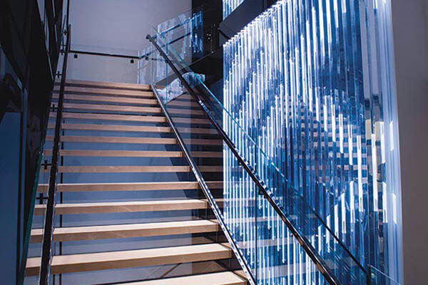 Designer Retail Construction Experts - Burberry Chicago interior stairwell