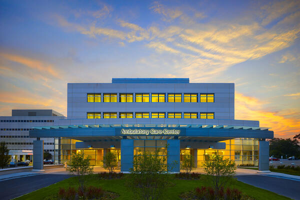 Chicago Hospital Construction Company - Northshore Skokie exterior with logo sign at dusk