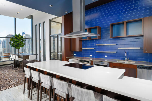 LEED Certified Apartment Construction - State & Chestnut communal kitchen with skyline views
