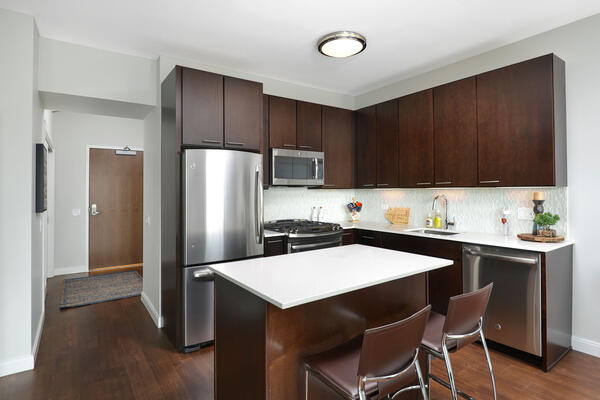 LEED Certified Apartment Construction - State & Chestnut unit kitchen with island