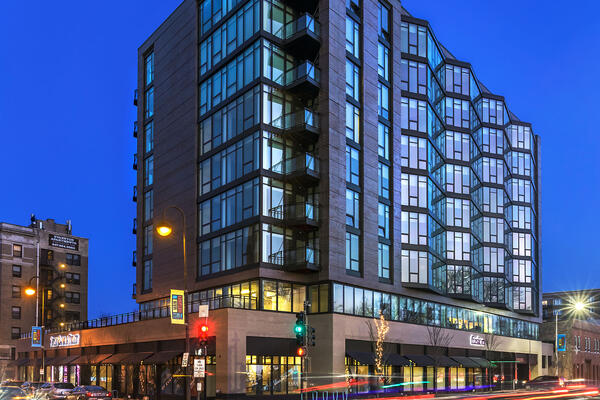 Chicago Luxury Apartment Development - The Main exterior corner of building at dusk