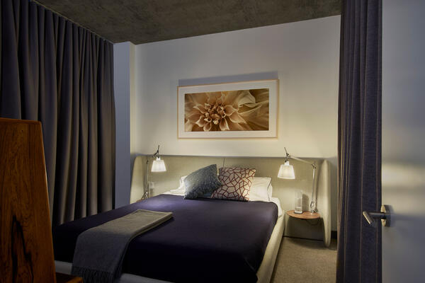 Residential and Multi-Family Construction - The Mason apartment bedroom at night